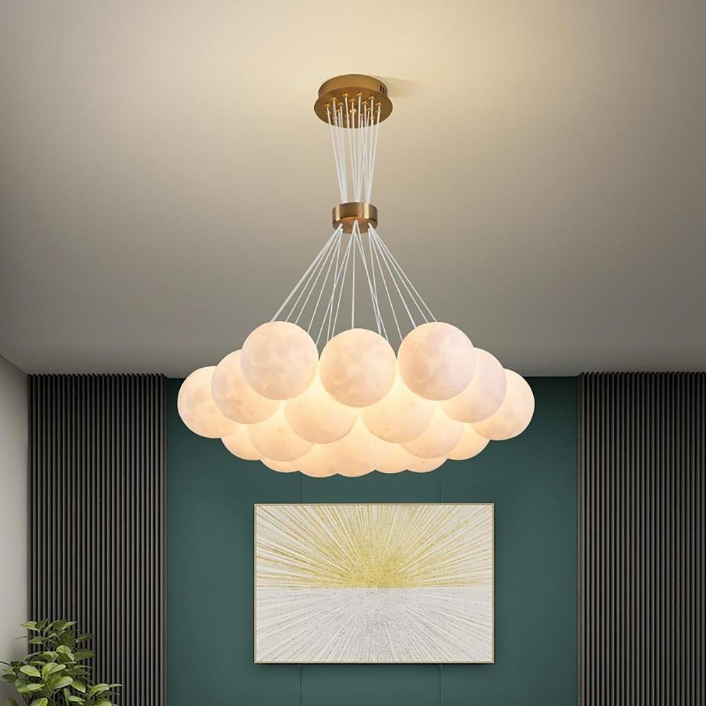 How a Globe Chandelier Can Soften a Room Full of Straight Lines